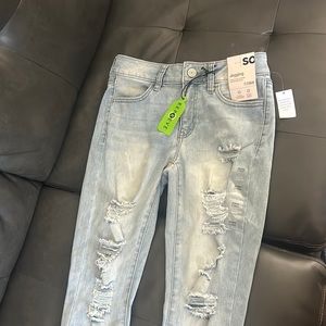 light wash jeggings with rips size 7/28W